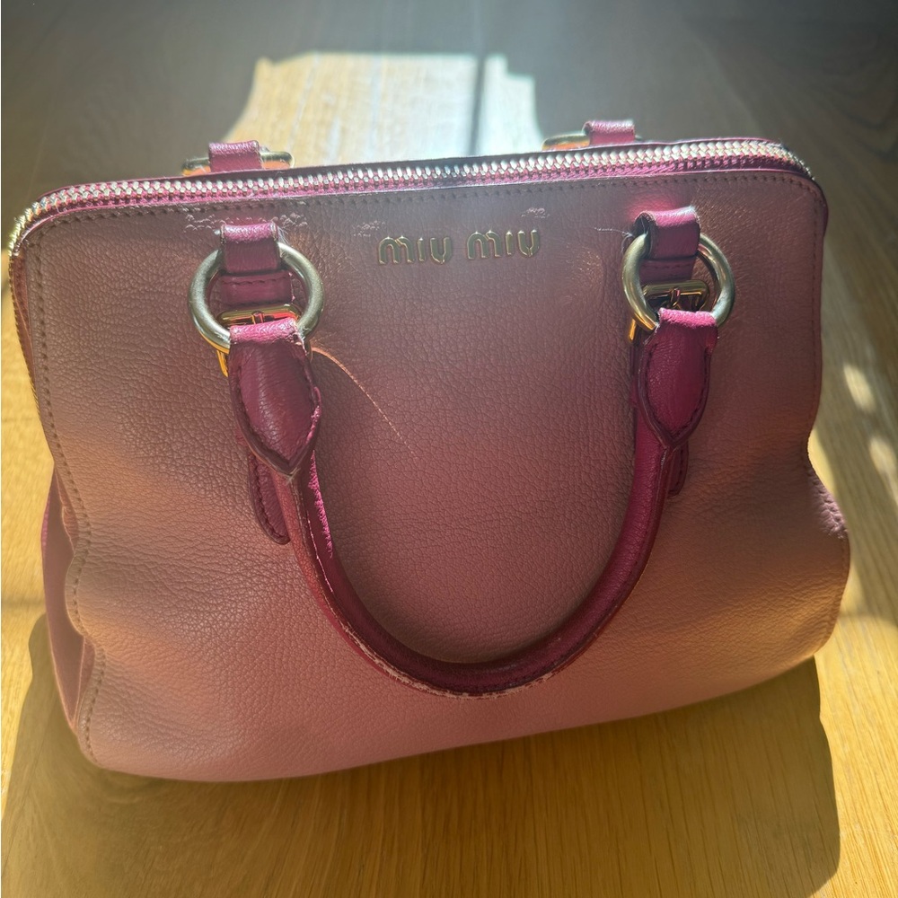 Miu Miu 
Madras two way 
Lined Handbag Interior